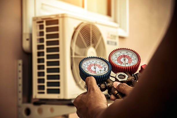 Professional Air Conditioning Service technician working in Porter, TX
